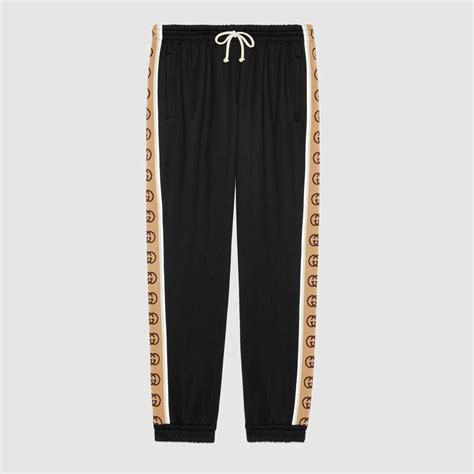 gucci side stripe pants|Gucci jogging pants.